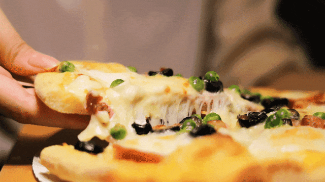 比萨星人速冲！达美乐比萨限时买一送一*，美味加倍享！